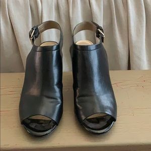 Black leather and patent leather wedges